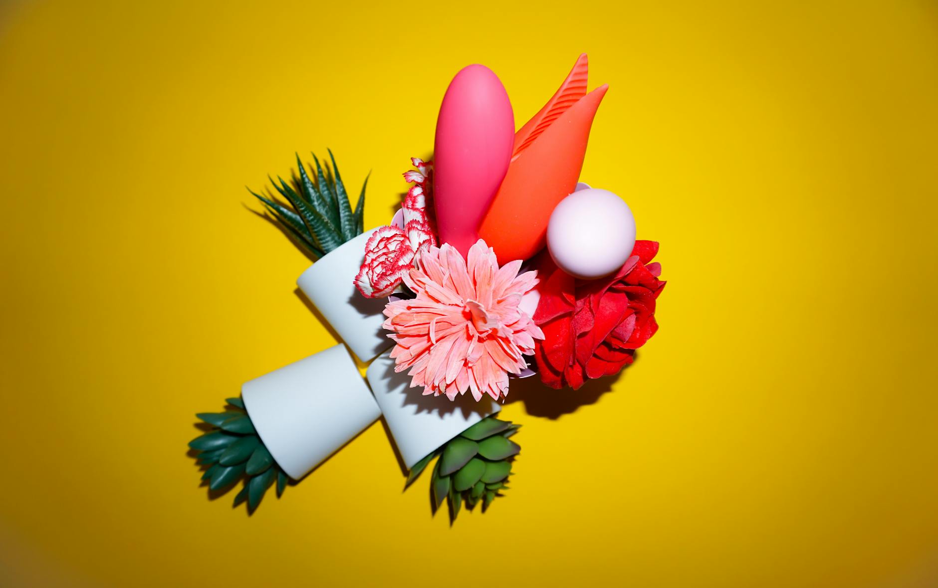 A couple holding a vibrator together, symbolizing intimacy recovery and reconnection after conflict